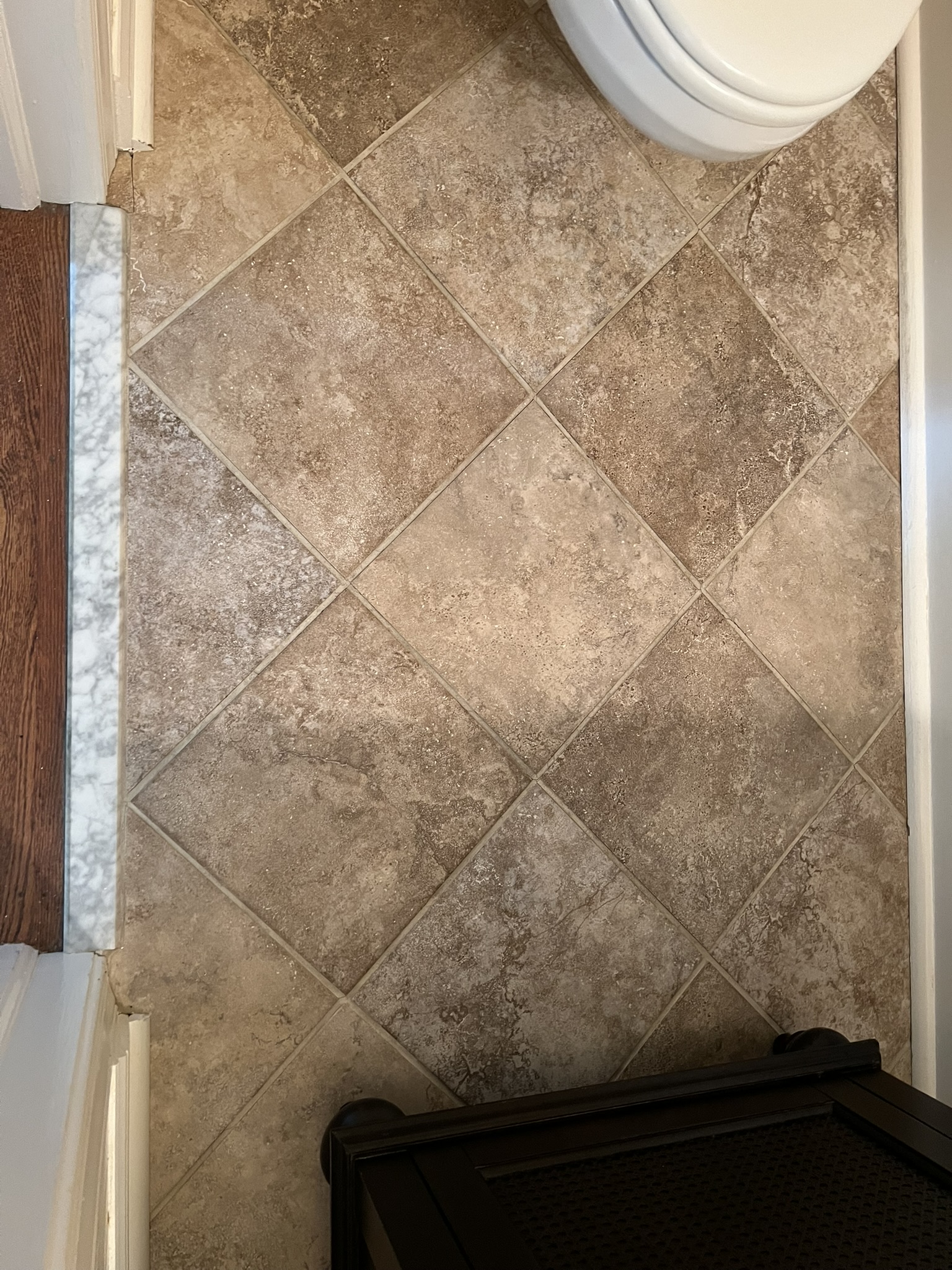 Bathroom tile with clean grout after cleaning